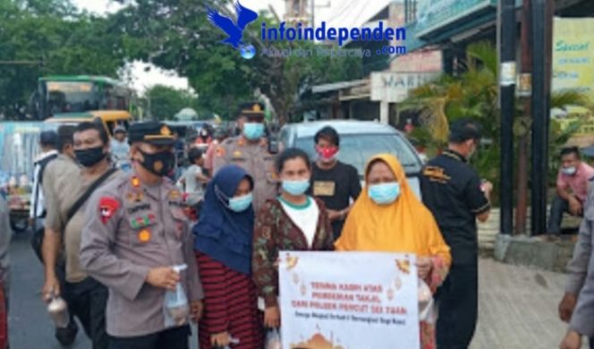 
					Polsek Percut Sei Tuan Bagikan 200 Bungkus Takjil  Kepengguna Jalan