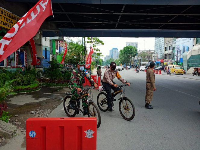 
					Bentuk Sinergitas TNI Polri Pos Pam V Carrefour Patroli Bersepeda