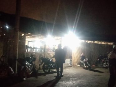 Foto: Lokasi judi dadu di bekas perumahan pengungsi Gn. Sinabung Desa Ndokum Siroga. 